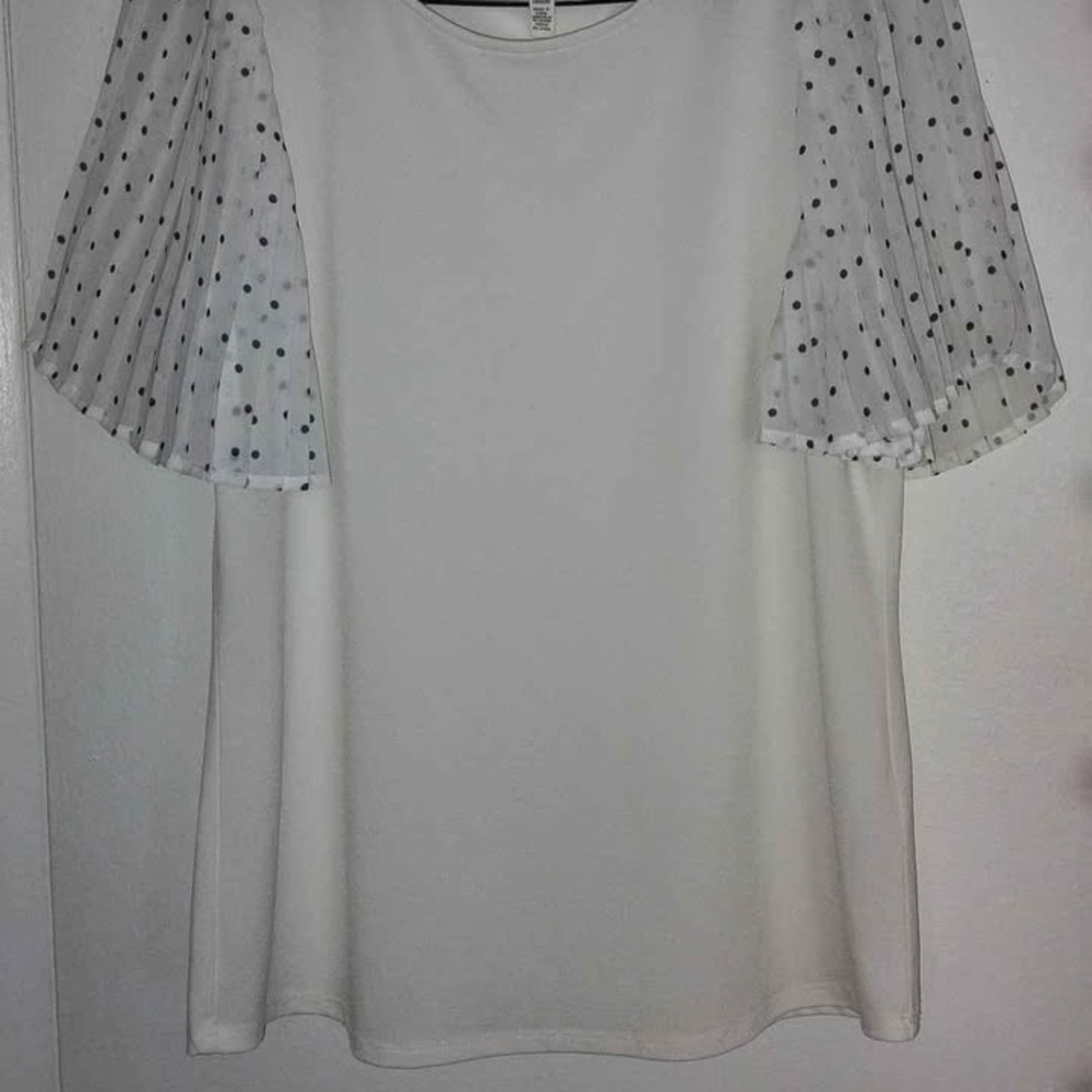 Elegant White Top with Polka Dot Sleeves